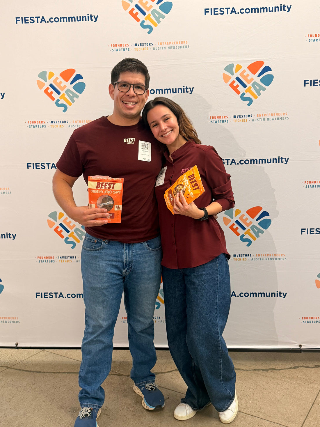 BEEST Snacks co-founders Lucas Prado and Nicole Ruiz smiling together at a FIESTA Connect pitch event