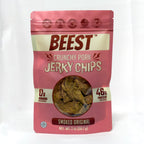 Front of a 2 oz bag of BEEST Crunchy Pork Jerky Chips, Smoked Original, on a white background, showing 0g sugars and 46g protein per serving.