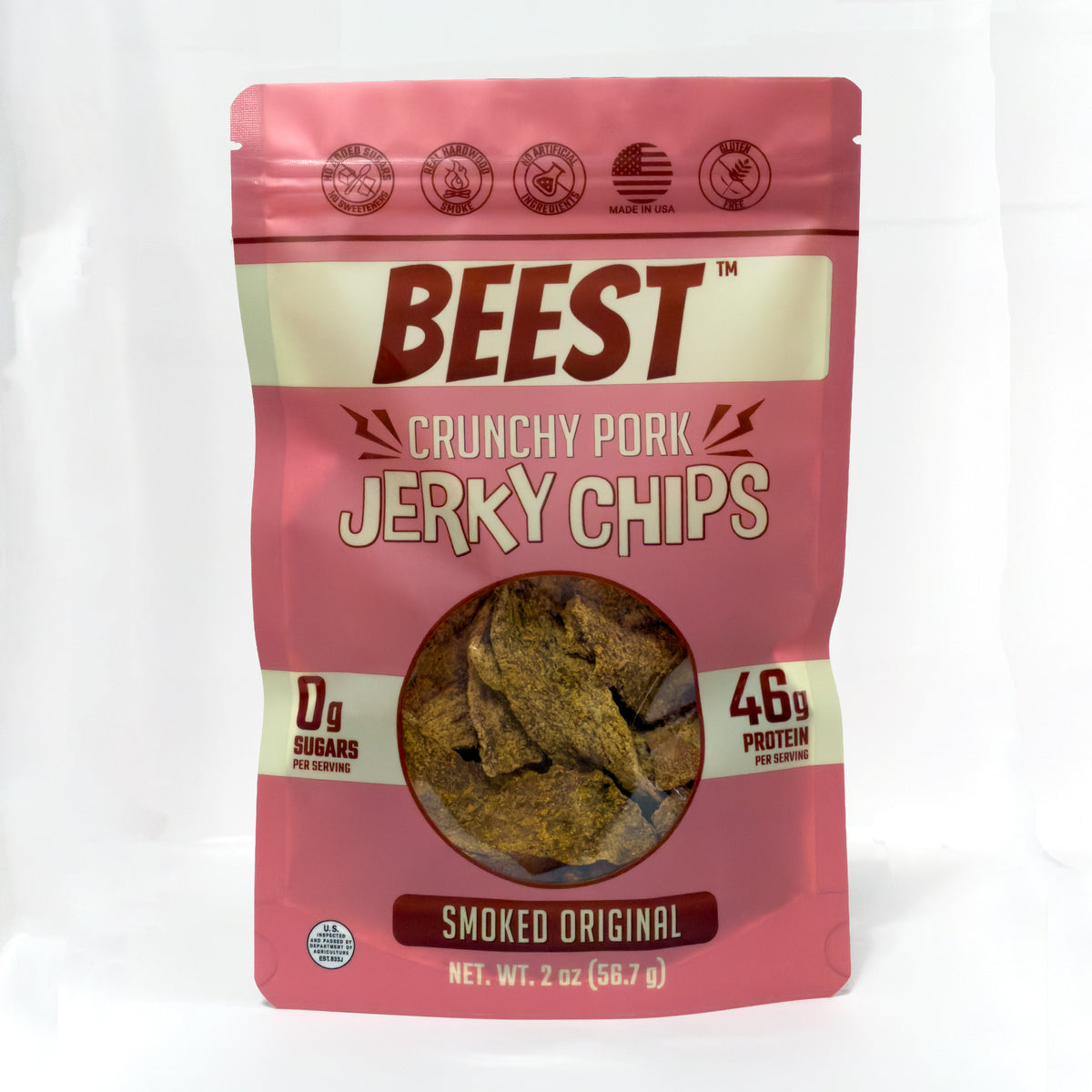Front of a 2 oz bag of BEEST Crunchy Pork Jerky Chips, Smoked Original, on a white background, showing 0g sugars and 46g protein per serving.